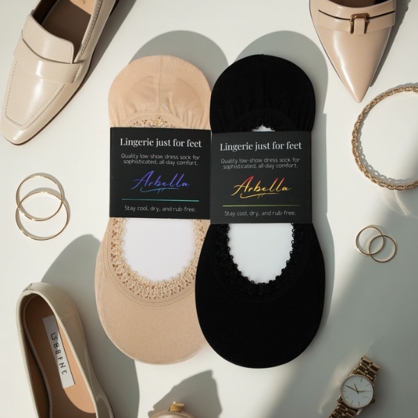 Arbella Style Duo Pack flat lay - 1 black and 1 sand nude no-show footie set