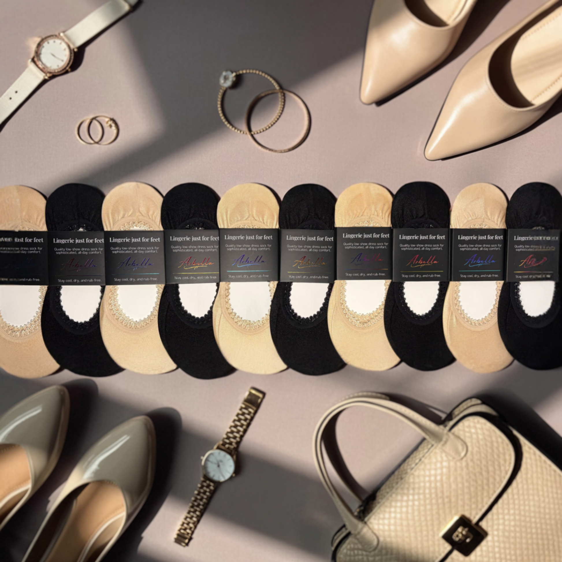 Arbella Style Luxe 10-Pack flat lay - 5 black and 5 sand nude no-slip footies with free shipping